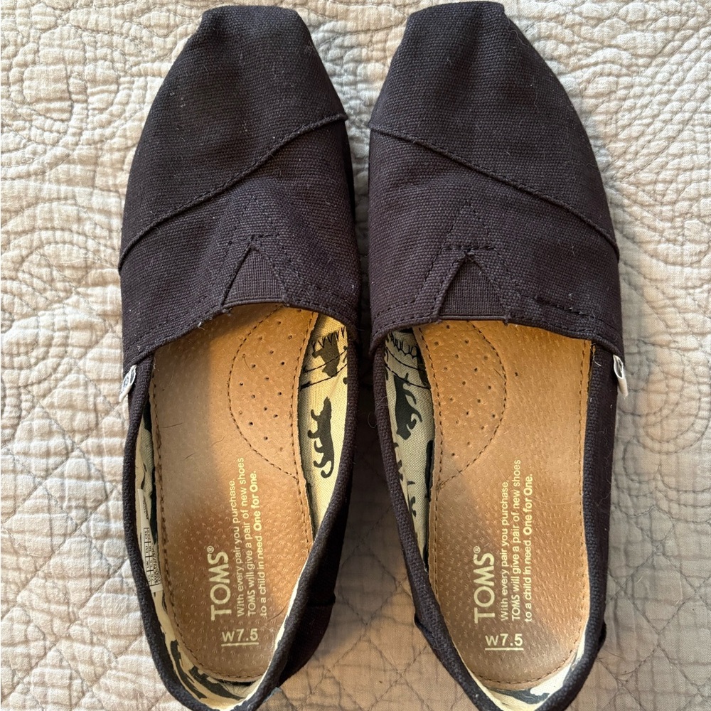 TOMS Black Canvas Slip-Ons
